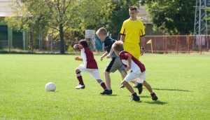 kids soccer game - kids playing soccer